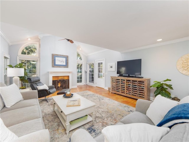 living room with crown molding, vaulted ceiling, and light parquet flooring