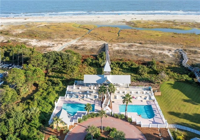 bird's eye view with a beach view and a water view