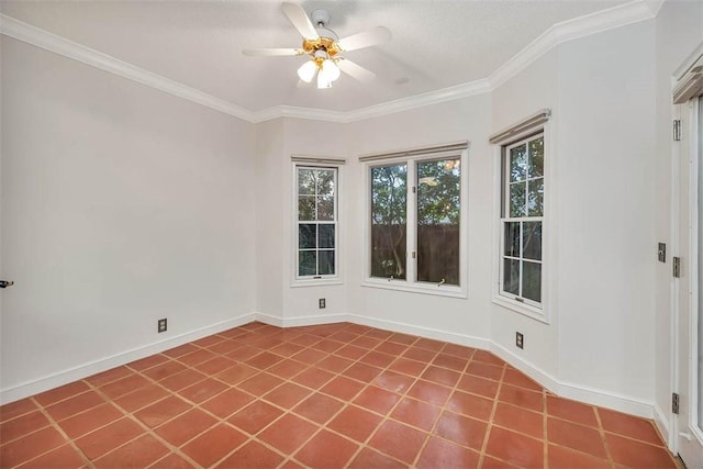 spare room with tile patterned floors, ceiling fan, and ornamental molding