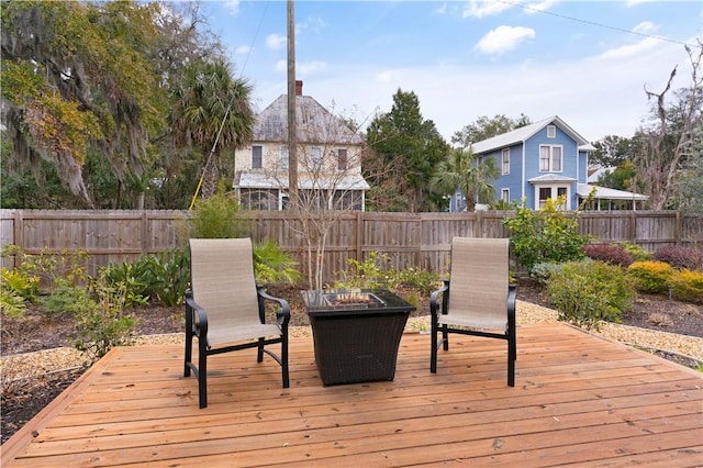 deck featuring an outdoor fire pit