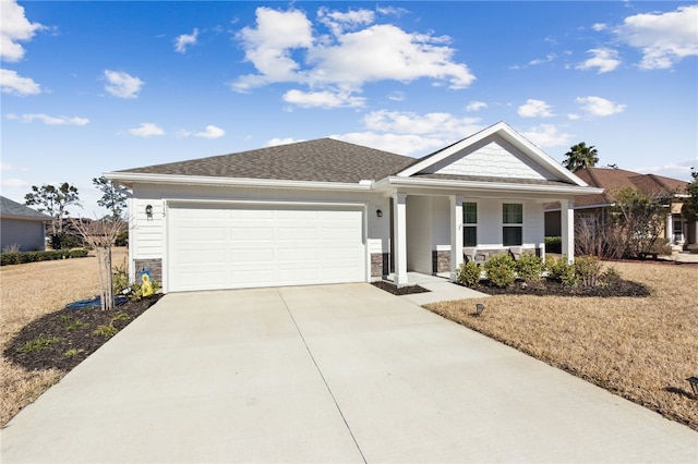 single story home featuring a garage and a porch