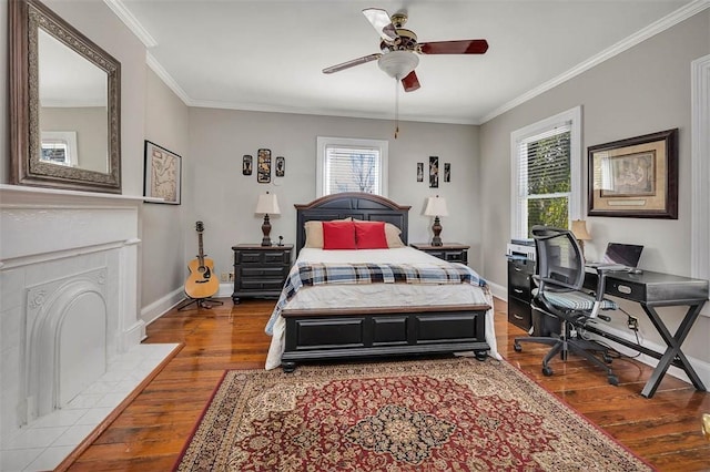 bedroom with multiple windows, ornamental molding, and wood finished floors