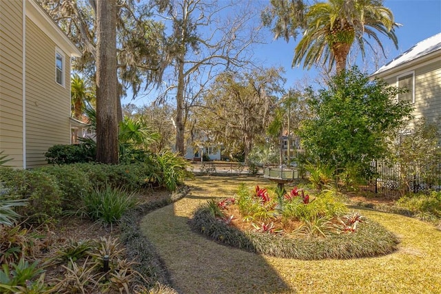 view of yard featuring fence