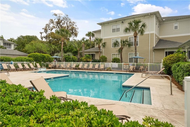 view of pool featuring a patio