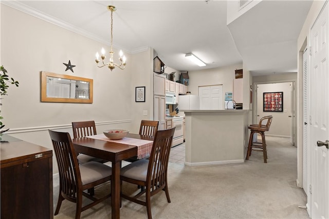 dining space featuring light carpet, an inviting chandelier, and ornamental molding