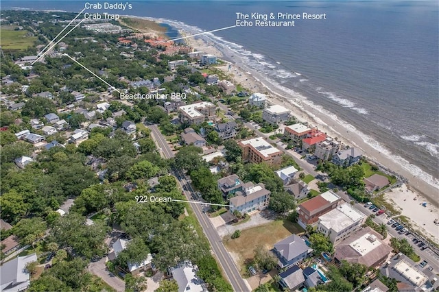 bird's eye view with a water view and a view of the beach