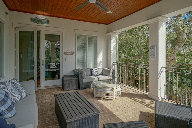 view of patio / terrace featuring outdoor lounge area, french doors, and ceiling fan