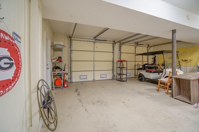 garage featuring a carport