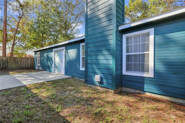 view of home's exterior with a patio