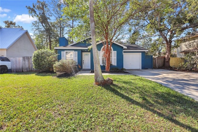 single story home featuring a front yard and a garage