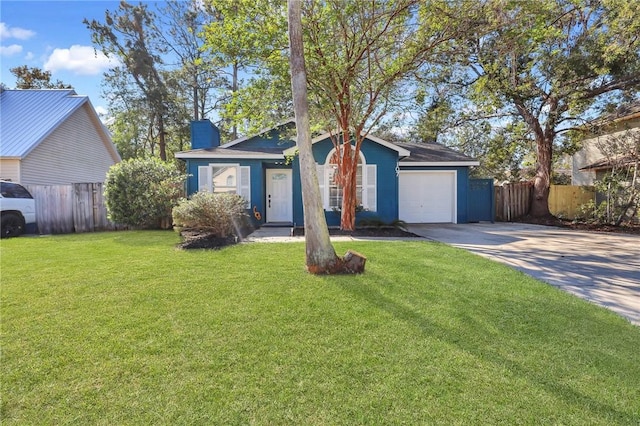 ranch-style house with a front yard and a garage