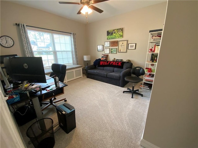 office space featuring ceiling fan and carpet floors