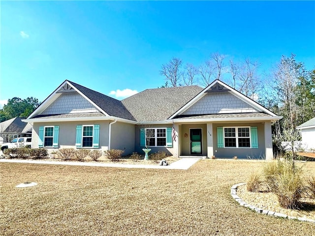 view of front of home featuring a front lawn