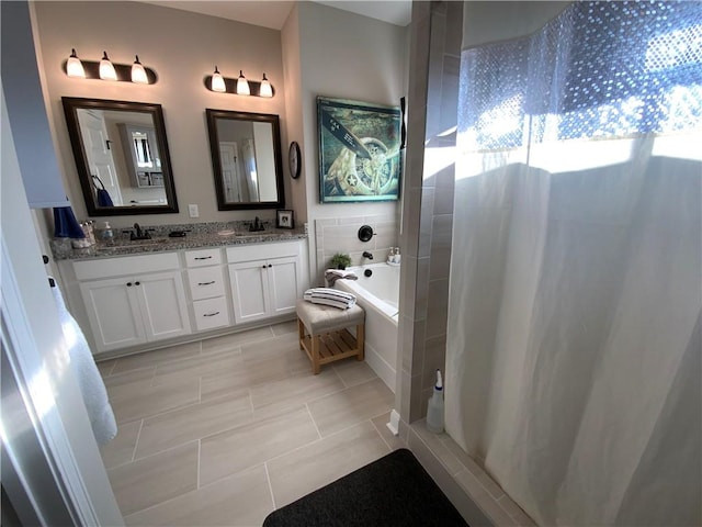 bathroom with vanity, shower with separate bathtub, and tile patterned flooring