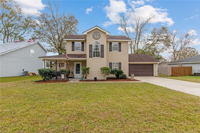 view of front of property with covered porch, a garage, a front yard, and central AC