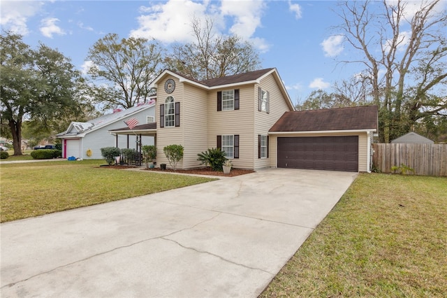 view of property with a front lawn and a garage