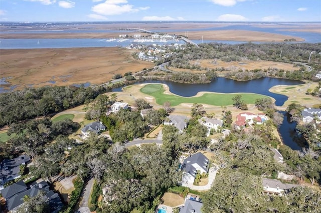 birds eye view of property featuring a water view and golf course view