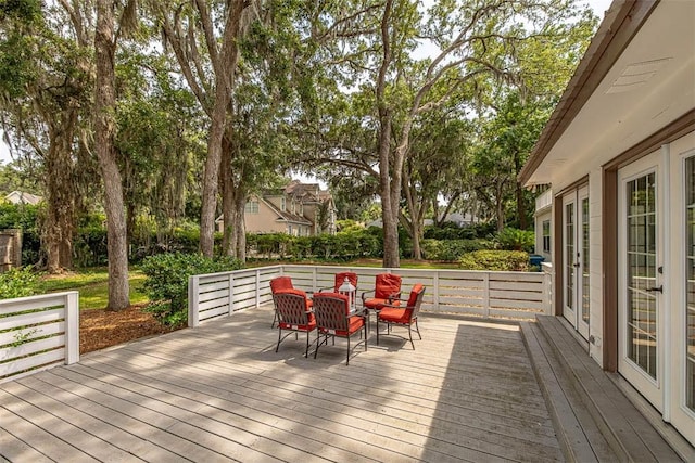 deck with outdoor dining space