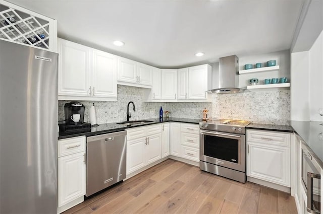 kitchen with extractor fan, a sink, white cabinetry, appliances with stainless steel finishes, and open shelves