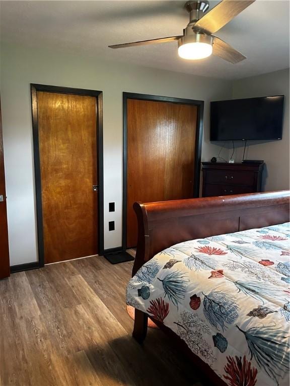 604 E Waring St, Waycross, GA 31501 - bedroom with wood finished floors and a ceiling fan