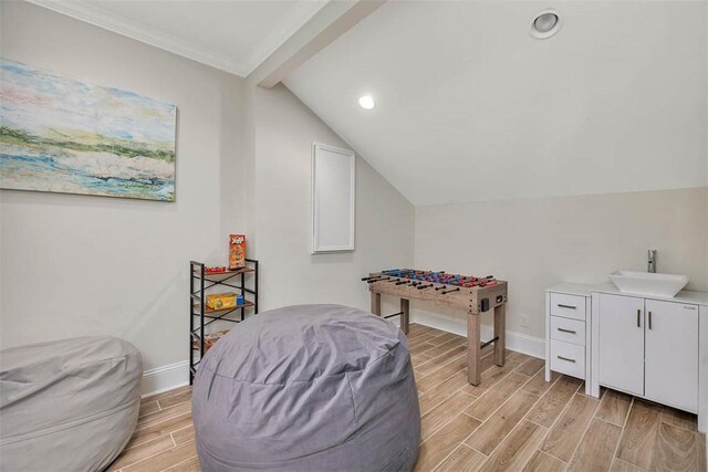bedroom with ceiling fan, access to exterior, ornamental molding, and light hardwood / wood-style flooring