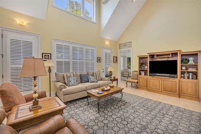 living room with light tile patterned floors and a towering ceiling