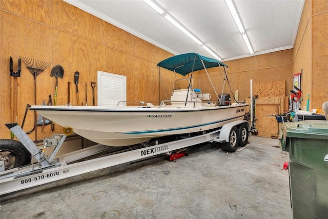 garage with wood walls