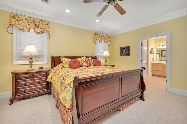 bedroom featuring ornamental molding, light carpet, baseboards, recessed lighting, and connected bathroom