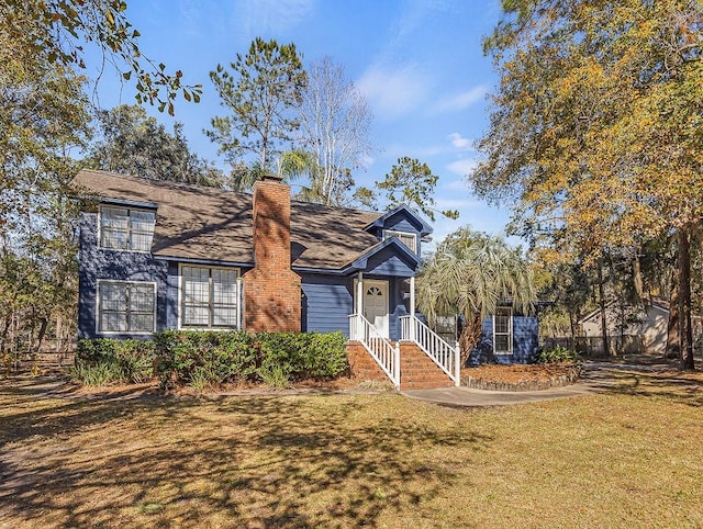 view of front of home featuring a front lawn