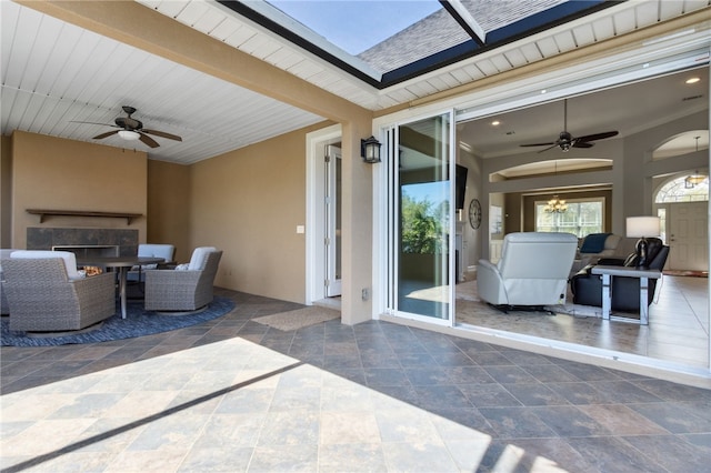 view of patio featuring outdoor lounge area and a ceiling fan