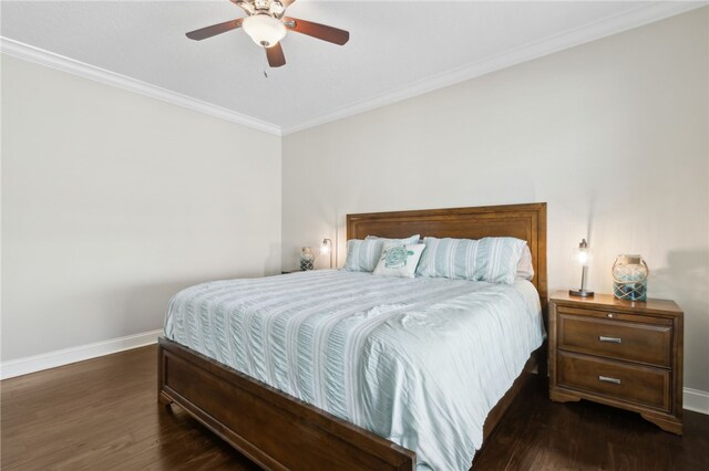 bedroom featuring a ceiling fan, ornamental molding, baseboards, and dark wood finished floors