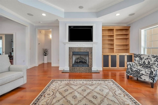17 Willow Ct, Brunswick, GA 31523 - living room featuring wood finished floors, a fireplace, ornamental molding, baseboards, and recessed lighting