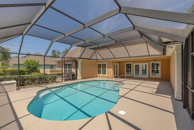 17 Willow Ct, Brunswick, GA 31523 - outdoor pool featuring french doors, a patio area, and glass enclosure