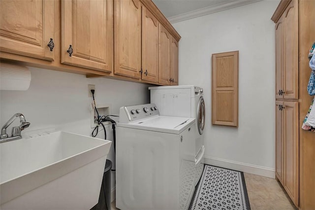 17 Willow Ct, Brunswick, GA 31523 - laundry room with washer and clothes dryer, ornamental molding, cabinet space, and baseboards