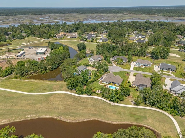 17 Willow Ct, Brunswick, GA 31523 - aerial overview of property's location with nearby suburban area, a large body of water, a golf club, and a tree filled landscape