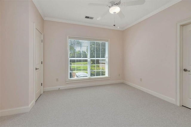 17 Willow Ct, Brunswick, GA 31523 - spare room featuring light carpet, a ceiling fan, crown molding, and baseboards