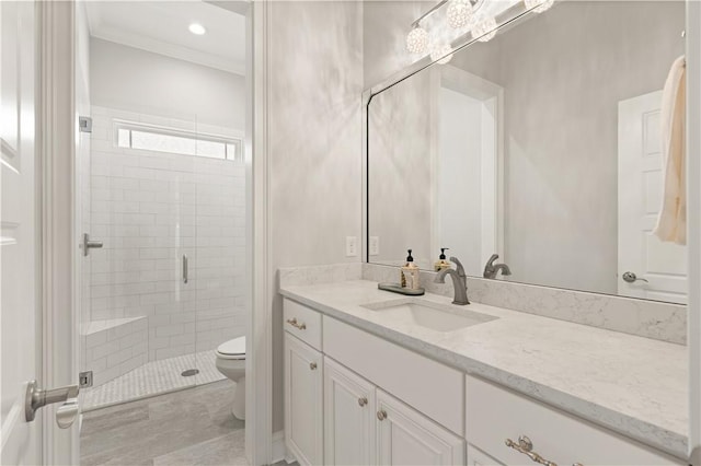 107 Cason Noah Dr, Kingsland, GA 31548 - bathroom with walk in shower, vanity, ornamental molding, and toilet
