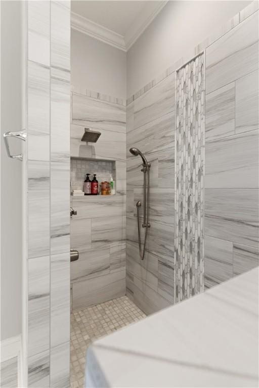 107 Cason Noah Dr, Kingsland, GA 31548 - bathroom featuring a tile shower and ornamental molding