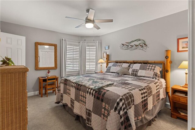 bedroom featuring ceiling fan and carpet floors