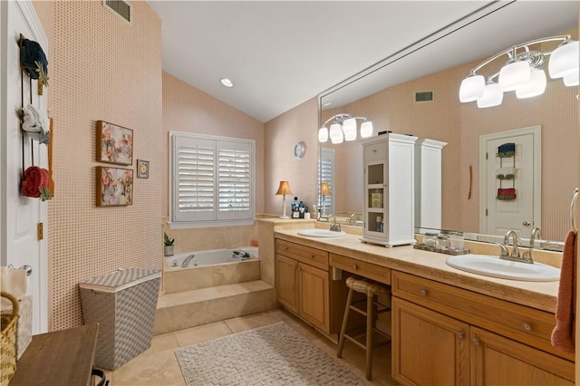 bathroom with tile patterned floors, vanity, plus walk in shower, and vaulted ceiling