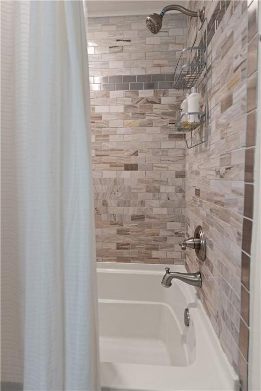 bathroom with shower / tub combo