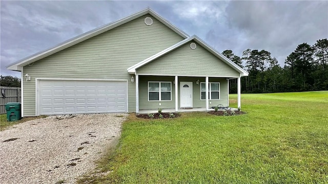 view of front of house with a front lawn and a garage