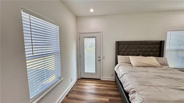 bedroom with hardwood / wood-style floors