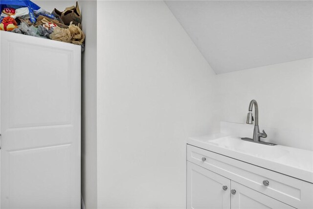 clothes washing area featuring a sink