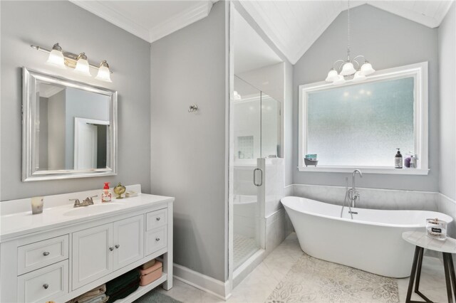 40 Jada Ln, Brunswick, GA 31523 - full bathroom with a stall shower, vanity, a freestanding bath, a chandelier, and crown molding