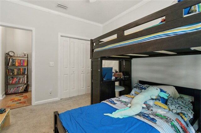 40 Jada Ln, Brunswick, GA 31523 - bedroom featuring carpet, crown molding, baseboards, and a closet