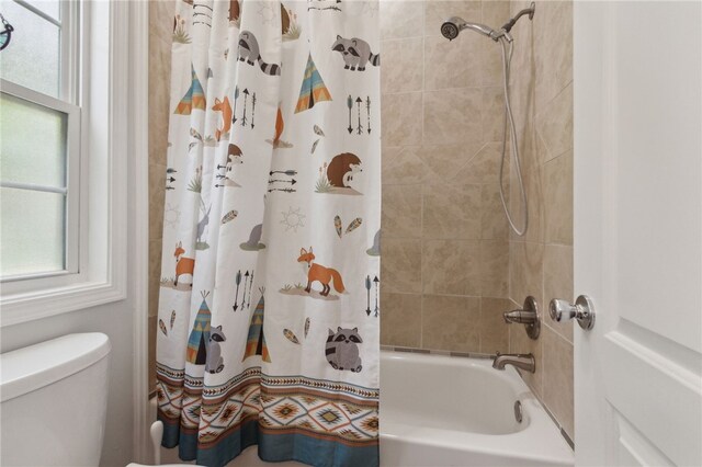 40 Jada Ln, Brunswick, GA 31523 - bathroom with shower / tub combo with curtain and toilet