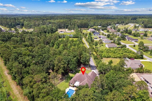 40 Jada Ln, Brunswick, GA 31523 - aerial overview of property's location with a heavily wooded area and nearby suburban area