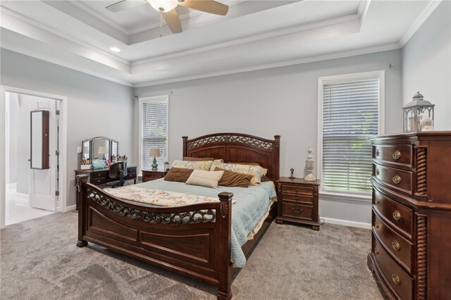 40 Jada Ln, Brunswick, GA 31523 - bedroom with carpet floors, a raised ceiling, multiple windows, ornamental molding, and recessed lighting