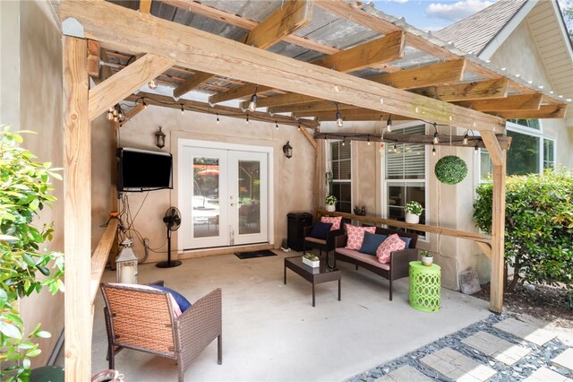 40 Jada Ln, Brunswick, GA 31523 - view of patio / terrace featuring french doors and an outdoor living space
